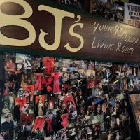 BJ's Lounge - New Orleans Dive Bar - Photo Wall