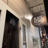 Black Penny - New Orleans Dive Bar - Front Door Sign