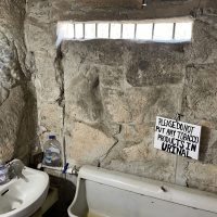 Devil's Backbone Tavern - Texas Dive Bar - Bathroom