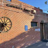 Mother Lode Bar & Deli - Sacramento Dive Bar - Exterior Wagon Wheel