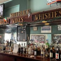 Sovereign Liquors - Chicago Dive Bar - Back Bar Signs