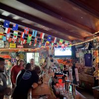 Rossi's Liquors - Chicago Dive Bar - Flag Roof